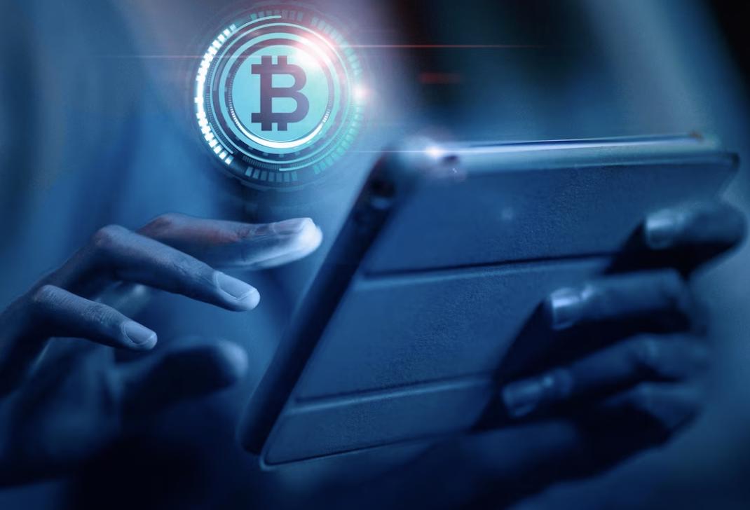 https://www.freepik.com/free-photo/close-up-hands-holding-tablet_19925272.htm#query=bitcoin&position=19&from_view=search&track=sph